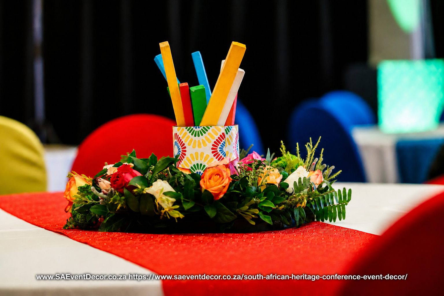 South African Heritage Conference Decor By SA Event Decor Centre piece in Stick red