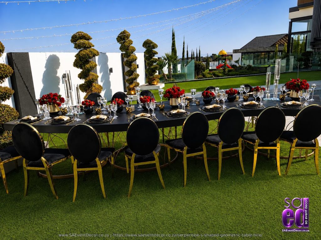 BLACK, GOLD & RED: A PRIVATE CELEBRATION AT BLUE HILLS EQUESTRIAN ESTATE 1 Blue Hill Equestrian Estate S Shaped Serpentine Geometric Table Hire SA Event Decor gold rim chairs