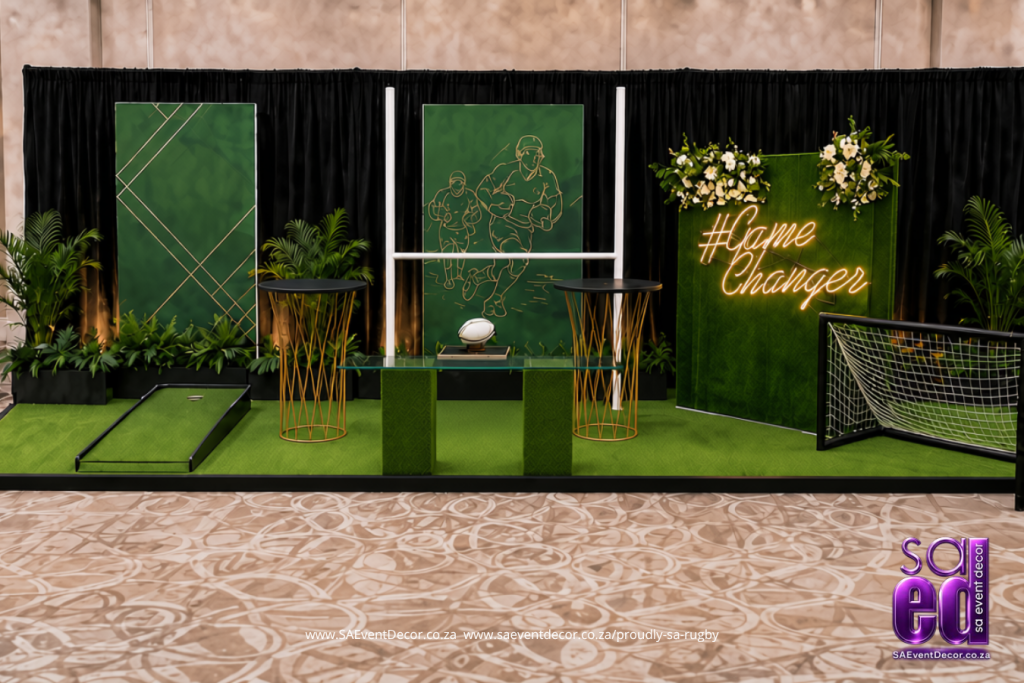 Mixed Sports backdrops paired with black and gold high top tables designed by SA Event Decor