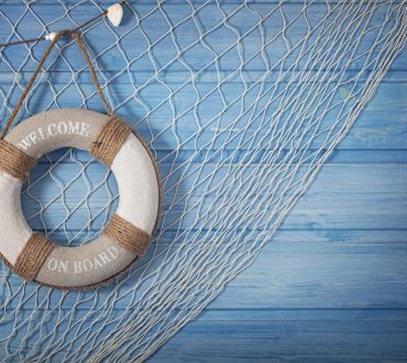 Life buoy decoration on blue shabby background