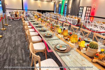 Event case studies Alexforbes awards rustic banquet chairs backdrop by SA Event Decor